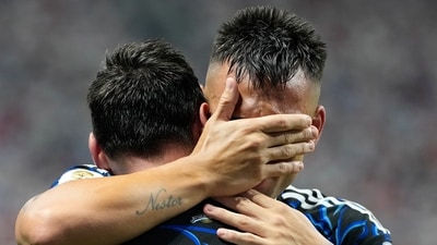 Argentina's Lautaro Martinez hugged teammate Lionel Messi, celebrating after scoring their side's second goal. (AP Photo) Argentina's Lautaro Martinez hugged teammate Lionel Messi, celebrating after scoring their side's second goal. (AP Photo)