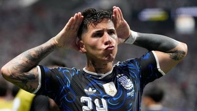 Enzo Fernandez brought Argentina level in the 85th minute, rifling home from Messi's assist, but the defending champions were far from finished. (AP Photo) Enzo Fernandez brought Argentina level in the 85th minute, rifling home from Messi's assist, but the defending champions were far from finished. (AP Photo)