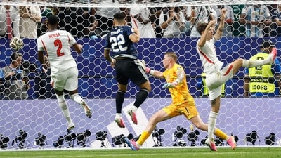 Substitute Lautaro Martinez then headed in another Messi delivery deep into stoppage time to complete a stunning comeback, leaving England with no time to respond. (AP Photo) Substitute Lautaro Martinez then headed in another Messi delivery deep into stoppage time to complete a stunning comeback, leaving England with no time to respond. (AP Photo)