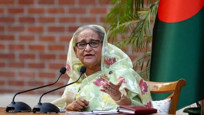 বাংলাদেশের প্রাক্তন প্রধানমন্ত্রী শেখ হাসিনার দেশে ফেরার ইচ্ছাপ্রকাশের পর নতুন করে চর্চা শুরু হয়েছে ভারত-বাংলাদেশ সম্পর্ক এবং তাঁর সম্ভাব্য প্রত্যর্পণ নিয়ে। (REUTERS)