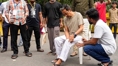 Climate activist Sonam Wangchuk attends as Abhijit Debaki, founder of the Cockroach Janata Party (CJP), looks on during a protest organized by the CJP demanding the resignation of Union Education Minister Dharmendra Pradhan over alleged irregularities in the NEET exam, at Jantar Mantar, in New Delhi. (PTI) Climate activist Sonam Wangchuk attends as Abhijit Debaki, founder of the Cockroach Janata Party (CJP), looks on during a protest organized by the CJP demanding the resignation of Union Education Minister Dharmendra Pradhan over alleged irregularities in the NEET exam, at Jantar Mantar, in New Delhi. (PTI)