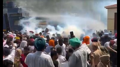 Police use tear gas on MGNREGA employees demanding pending wages outside the residence of Punjab rural development minister Tarunpreet Singh Sond in Khanna on Wednesday. (HT Photo) Police use tear gas on MGNREGA employees demanding pending wages outside the residence of Punjab rural development minister Tarunpreet Singh Sond in Khanna on Wednesday. (HT Photo)