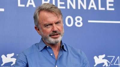 (FILES) Sam Neill died in Australia on July 13, his family said in a statement. (Photo by Tiziana FABI / AFP) (AFP) (FILES) Sam Neill died in Australia on July 13, his family said in a statement. (Photo by Tiziana FABI / AFP) (AFP)