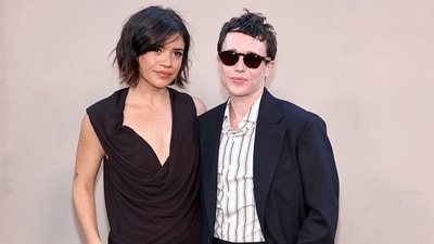 Elliot Page attended The Odyssey New York Premiere with his girlfriend, Julia Shiplett. He wore a sleek, tailored black suit styled with a pinstriped shirt and dress shoes. (Getty Images via AFP) Elliot Page attended The Odyssey New York Premiere with his girlfriend, Julia Shiplett. He wore a sleek, tailored black suit styled with a pinstriped shirt and dress shoes. (Getty Images via AFP)