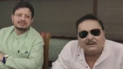 Madan Mitra with Trinamool Congress (TMC) rebel faction leader Ritabrata Banerjee after he said he had resigned from his positions in the Mamata Banerjee-led TMC. (Video grab: PTI) Madan Mitra with Trinamool Congress (TMC) rebel faction leader Ritabrata Banerjee after he said he had resigned from his positions in the Mamata Banerjee-led TMC. (Video grab: PTI)