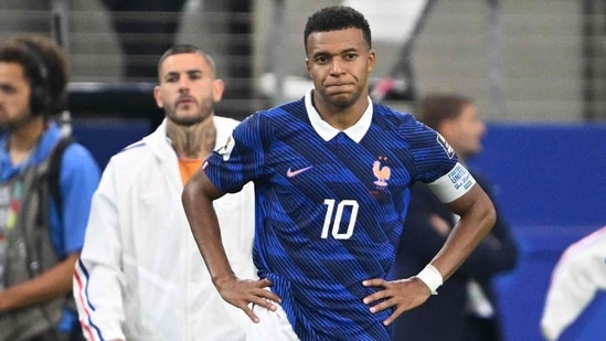 Kylian Mbappe looks on after France's defeat to Spain.