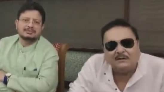 Madan Mitra with Trinamool Congress (TMC) rebel faction leader Ritabrata Banerjee after saying he had resigned from posts in the TMC led by Mamata Banerjee.