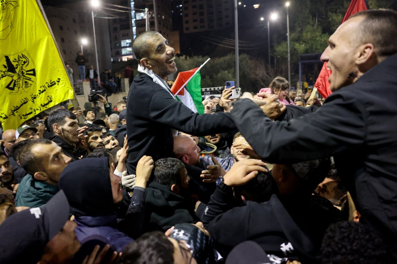 Zakaria Zubeidi is cheered by a crowd in Ramallah after his release as part of a ceasefire in 2025.