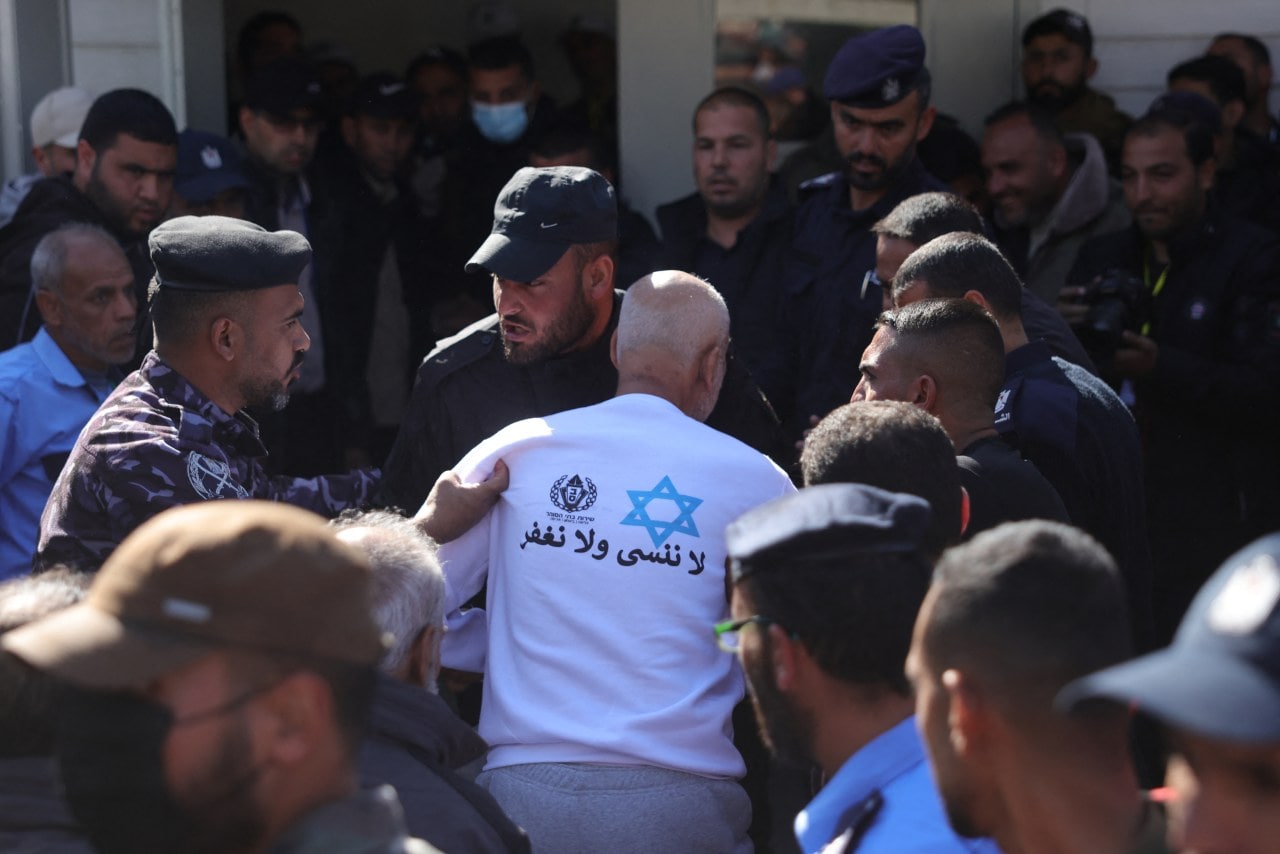 A just-released Palestinian prisoner wearing a sweatshirt with the phrase: ‘We neither forget, nor forgive.’