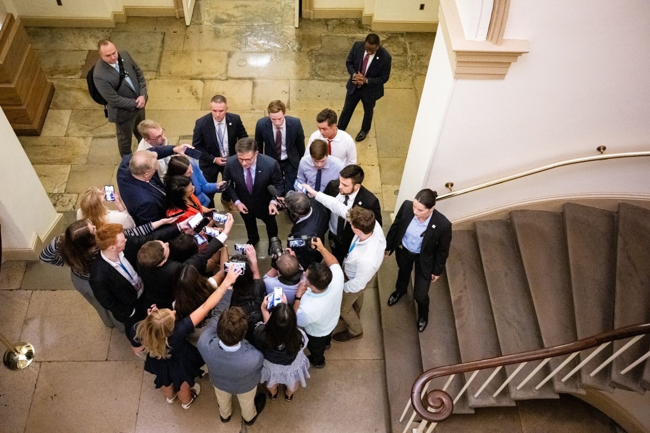 Johnson in a familiar scene: parrying with reporters in the halls of the Capitol. Johnson in a familiar scene: parrying with reporters in the halls of the Capitol.