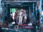 Two people died after a fire, suspected to have been triggered by a spark from an electric vehicle (EV) battery being charged in the stilt parking, broke out in a five-storey residential building in Mamura village Sector 66, in Noida, India, on Wednesday, July 15, 2026.