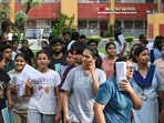 Aspirants leave from exam centre after appearing for the NEET-UG 2026 re-examination, in New Delhi.