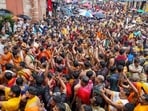 Devotees play traditional Odia gong (Ghanta) during the Mahaprabhu Jagannath Rath Yatra at Puri Jagannath temple, in Puri on Thursday.&nbsp;