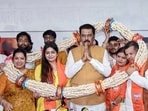 BJP Bihar president Sanjay Saraogi is felicitated with a garland along with former leaders of Jan Suraaj, Vikassheel Insaan Party (VIP) and an independent leader after they latter joined the BJP during a press conference in Patna on Thursday. (PTI)