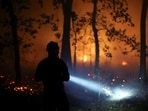 More than 100 wildfires are burning in Canada, where a train crew in northern Ontario filmed themselves surrounded by flames before being safely evacuated. 