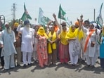 Farmer unions members block Basti Jodhewal Chowk during the protest in Ludhiana on Wednesday. (Gurpreet Singh/HT)
