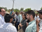 Kaithal DC Aparajita during her visit to Sajuma village on Wednesday. (HT Photo)