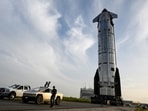 Starship 40 rolls out of the SpaceX production facility toward the launch pad as preparations continue for the 13th test flight of the Starship spacecraft and the Super Heavy v3 booster in Starbase, Texas.
