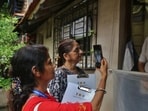 Thane, India - June -30, 2026: The special intensive revision programme of the electoral rolls for Thane district has been announced, and Booth Level Officers (BLOs) have been seen conducting door-to-door visits starting Tuesday, June 30 at Kharkar Ali area Thane . As per the directives of the Election Commission of India, a Special Intensive Revision (SIR) programme is being implemented in Thane district. In this regard, to ensure that the electoral rolls are more accurate and transparent, Thane District Collector and District Election Officer Dr. Shrikrishna Panchal has appealed to all voters in the district to cooperate with the Booth Level Officers (BLOs) visiting their respective areas between June 30 to July 29, 2026. Voters have been urged to fill out the enumeration forms and obtain proper acknowledgment receipts after submission ,in Thane ,in Mumbai, India, on, Tuesday, June -30, 2026. ( photo by Praful Gangurde / Hindustan Times ) (praful Gangurde)