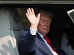 US President Donald Trump waves aboard Marine One in Carlisle, Pennsylvania.