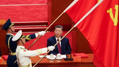 Chinese President Xi Jinping looks on as People’s Liberation Army honor guard hold party flags during a ceremony marking the 105th anniversary of the founding of the Communist Party of China at the Great Hall of the People in Beijing, China, July 1, 2026. (REUTERS)