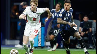 England's Anthony Gordon (18) and Argentina's Enzo Fernandez (24) run for the ball during the World Cup semifinal soccer match between England and Argentina in Atlanta (AP Photo/Erik S. Lesser) England's Anthony Gordon (18) and Argentina's Enzo Fernandez (24) run for the ball during the World Cup semifinal soccer match between England and Argentina in Atlanta (AP Photo/Erik S. Lesser)