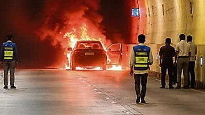 A Maruti Suzuki Ignis carrying five people was gutted in a fire inside the Coastal Road tunnel on Wednesday. While all passengers managed to escape, panicked motorists stranded inside the tunnel abandoned their vehicles and ran to safety.