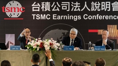 TSMC reported a 77% jump in second-quarter profits and announced a $100 billion investment in Arizona. (Photo by Lam Yik Fei/Bloomberg) (Bloomberg)