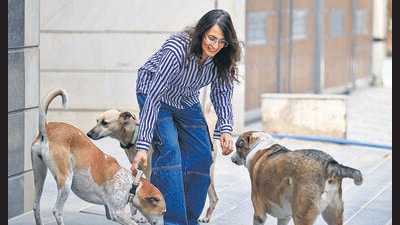 Vartika Sahani seen outside her house with dogs on Thursday. (Parveen Kumar/HT)