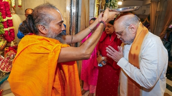 Union Home Minister Amit Shah participates in the Mangala Arti on the occasion of the Shri Jagannath Rath Yatra at the Shri Jagannath Temple, in Ahmedabad on Thursday.(@AmitShah X)