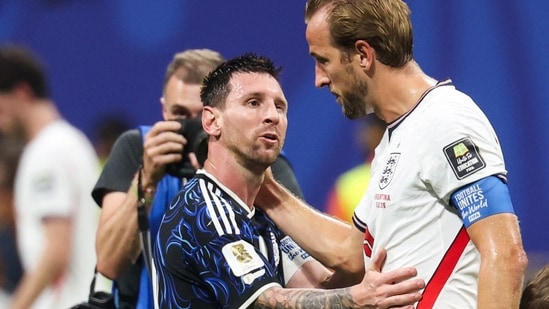 Lionel Messi greets Harry Kane after Argentina's 2-1 win.