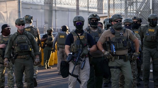 ICE agents guard outside of Delaney Hall Immigration Detention Center in Newark, New Jersey.