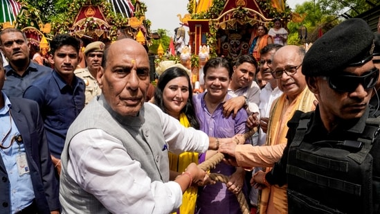 Union Defence Minister Rajnath Singh, along with BJP MP Bansuri Swaraj and others, pulls the chariot during the 59th Shri Jagannath Rath Yatra, organised by Shri Jagannath Mandir &amp; Odisha Arts and Cultural Centre (OACC), at Tyagraj Nagar, in New Delhi, Thursday, July 16, 2026. (PTI Photo)