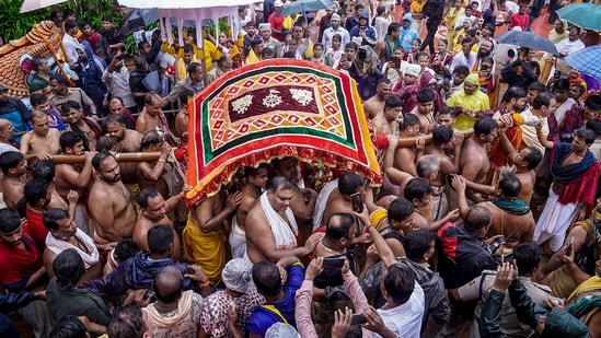 In this image posted on July 16,, Priests and servitors take out a procession as the annual Jagannath Rath Yatra commences, at Jagannath Dham in Puri, Odisha. (@JagannathaDhaam/X)
