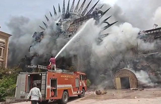 The fire reportedly began near the entrance gate and spread through polystyrene structures and scrap material stored inside the complex. (Parveen Kumar/HT) The fire reportedly began near the entrance gate and spread through polystyrene structures and scrap material stored inside the complex. (Parveen Kumar/HT)