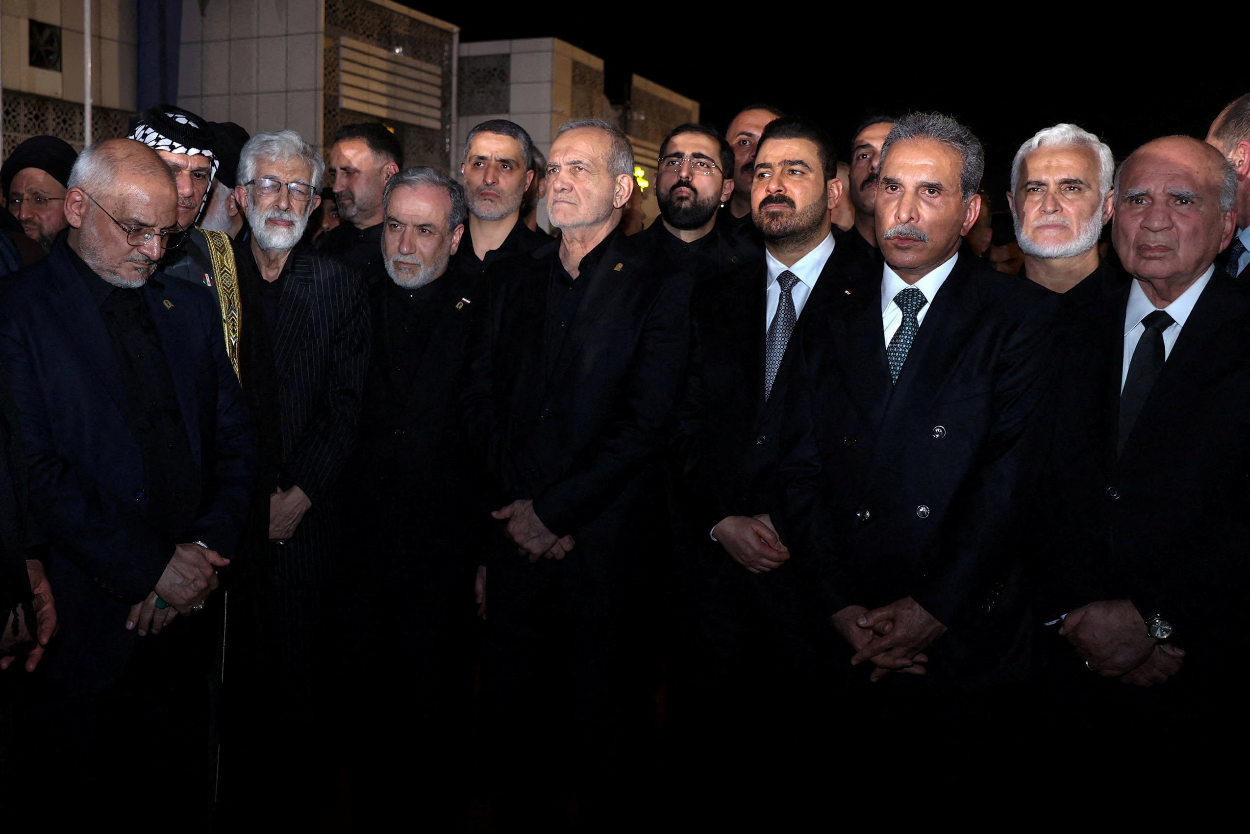 Iraqi Prime Minister Ali al-Zaidi, Iranian President Masoud Pezeshkian, Iraqi Foreign Minister Fuad Hussein attend a funeral ceremony for Iran’s late Supreme Leader Ayatollah Ali Khamenei, at Najaf International Airport in Najaf, Iraq. (REUTERS)