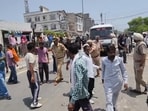 As the workers blocked the JCB, police intervened and used mild force to disperse the protesters before detaining 10 of them. (HT)