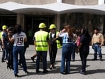 People evacuate a building after a powerful 7.4-magnitude earthquake struck off the coast of Mexico's southern state of Chiapas, triggering a tsunami warning and shaking buildings in neighboring Guatemala and El Salvador, in San Salvador, El Salvador, July 17, 2026. REUTERS/Jose Cabezas