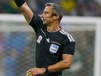 Referee Slavko Vincic was taken into custody during the raid, but was not charged with any offence.