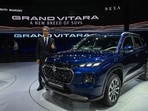 The managing director and chief executive officer of Maruti Suzuki India Limited (MSIL) Hisashi Takeuchi poses with the new SUV Grand Vitara during its global unveiling ceremony