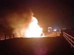 A fire burns on a damaged bridge in the aftermath of a strike, in Bandar Khamir, Hormozgan province, Iran July 16, 2026 