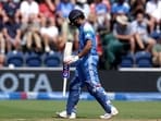 India’s Rohit Sharma walks off the pitch after being caught out by England's Jos Buttler during the second ODI. (AP) India’s Rohit Sharma walks off the pitch after being caught out by England's Jos Buttler during the second ODI. (AP)