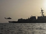 This US Navy handout photo released by US Central Command Public Affairs shows an MH-60R Sea Hawk taking off of the flight deck on May 19, 2026.