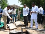 Water minister Parvesh Verma at Tyagaraj Stadium inspecting restored rainwater harvesting system. (Vipin Kumar/Hindustan Times)
