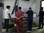 Mehta sustained serious injuries when he was supervising preparations beneath the tent and an iron rod from the temporary structure suddenly fell on his head. (In picture: Amar Mehta's mortal remains at a hospital)