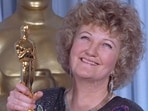 Brenda Fricker holds up her Oscar after winning the Best Supporting Actress category at Academy Awards on  March 26, 1990.