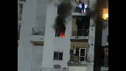Fire breaks out on 7th-floor at Noida high-rise after AC blast Fire breaks out on 7th-floor at Noida high-rise after AC blast