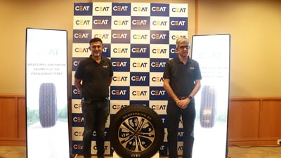 (L-R) Lakshminarayanan B , CMO and Arnab Banerjee, COO, CEAT with the CrossDrive tyres