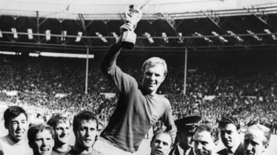 England's national soccer team captain Bobby Moore holds aloft the Jules Rimet trophy as he is carried by his teammates following England's victory over Germany in the World Cup final on July 30, 1966 at Wembley stadium in London. (AFP) England's national soccer team captain Bobby Moore holds aloft the Jules Rimet trophy as he is carried by his teammates following England's victory over Germany in the World Cup final on July 30, 1966 at Wembley stadium in London. (AFP)
