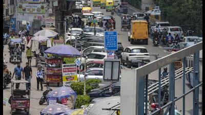 Footpaths in Indian cities are under constant siege. If they are not broken, they are encroached upon by parked cars, flowerpots, extended ramps of four-storey houses, security guard cabins, construction waste, mounds of garbage, dangerously low hanging overhead wires, and shop extensions. (PTI)